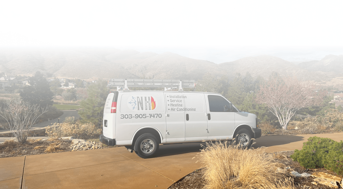 NH Services service van parked at a Colorado job site